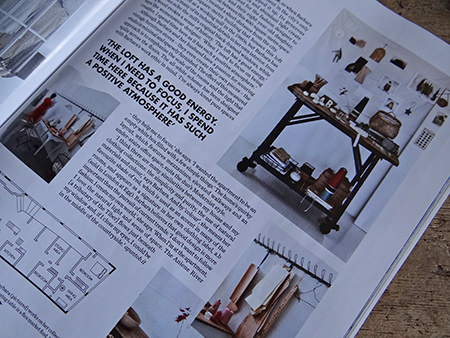 Minimalist workspace area with floor cushions in a modernist mill featured in Elle Decoration magazine Minimalist workspace area with floor cushions in a modernist mill featured in Elle Decoration magazine