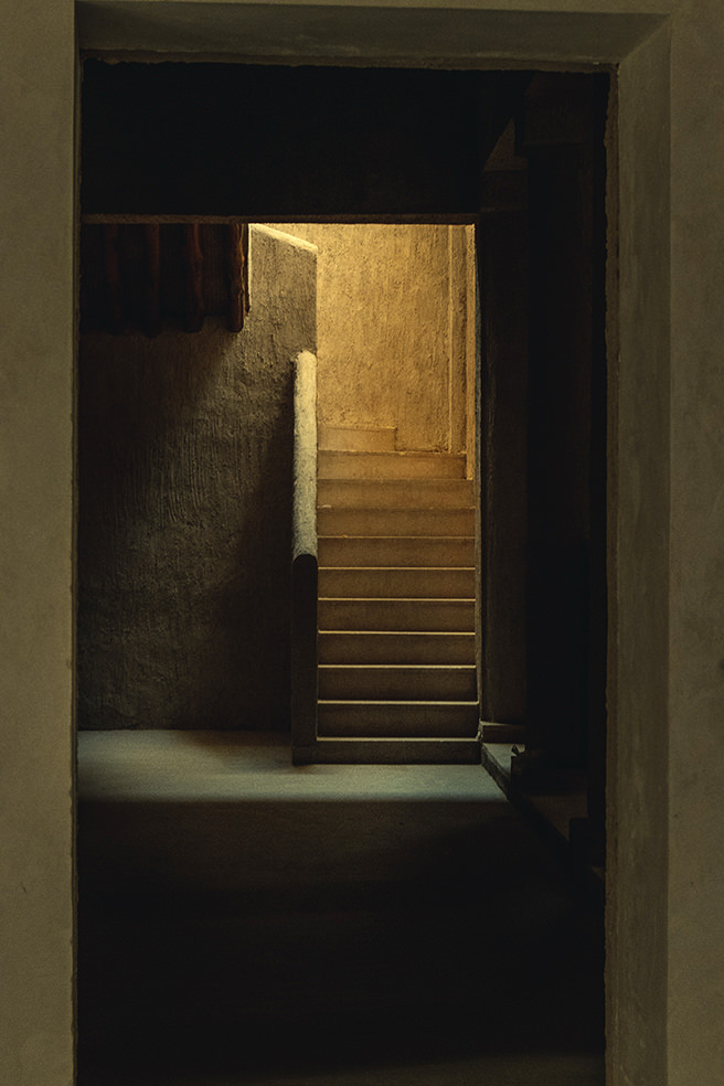 Lit stairs down to a basement