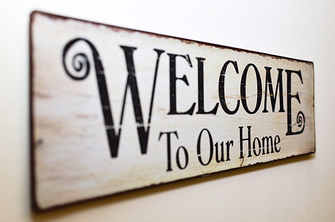 Welcome to our home painted sign