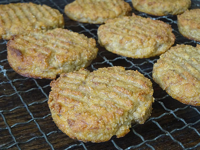 Home-made almond banana cookies cooling on a wire rack | H is for Home
