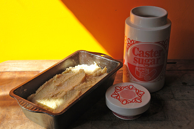 Almond loaf cake batter in a a tin