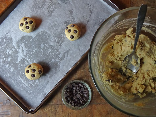 Rolling dark and white chocolate chip cookies mixture into balls | H is for Home