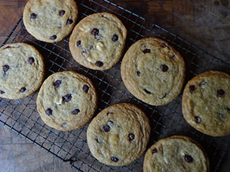 Dark and white chocolate chip cookies cooling on a wire rack | H is for Home