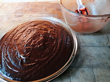 Chocolate ganache poured on to digestive base