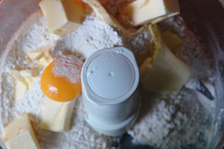 Sweet tart dough ingredients in a food processor bowl | H is for Home