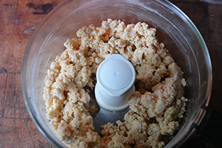 Mixed sweet tart dough ingredients in a food processor bowl | H is for Home