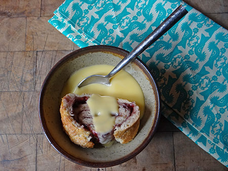 Bowl of jam roly poly and custard | @hisforhome