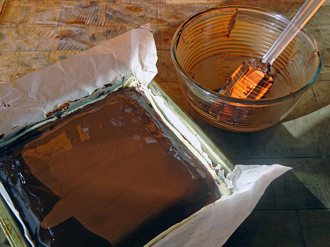 Adding the chocolate top layer in marzipan chocolate brownies | H is for Home