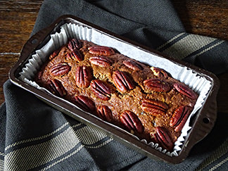 Cooked pecan toffee loaf cake batter in baking tin | H is for Home