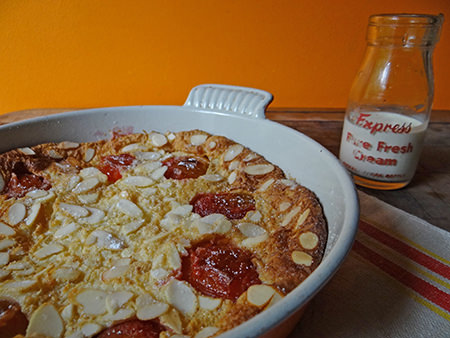 Home-made plum flaugnarde with small bottle of double cream via @hisforhome
