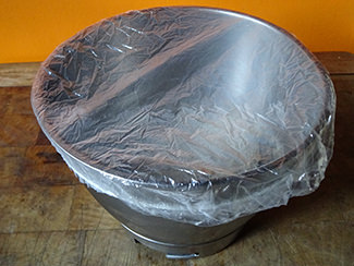 Covering raisin soudough loaf dough with food 'shower cap' | H is for Home