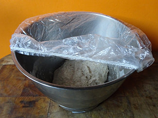 Covering raisin soudough loaf dough with food 'shower cap' | H is for Home