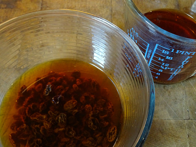 Saoking raisins in strong black tea | H is for Home