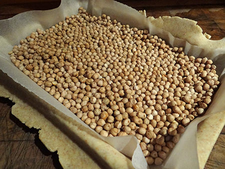 wholemeal shortcrust pastry flan case ready to be blind-baked