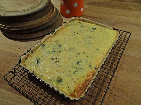 spinach, cheese & onion tart on a wire cooling rack | H is for Home