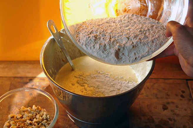 Folding flour into sweet potato cake mixture