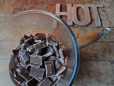 Melting dark chocolate in a glass bowl | @hisforhome