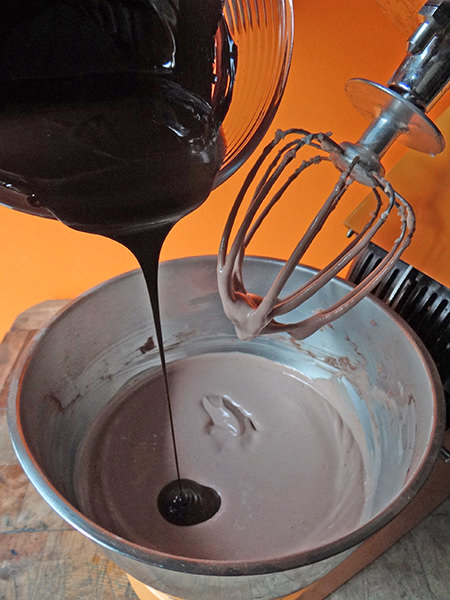 Adding melted dark chocolate to cheesecake mixture | @hisforhome