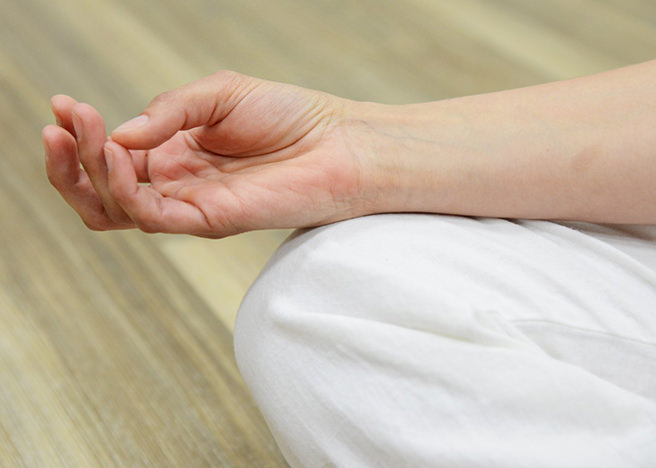 Hand of person meditating