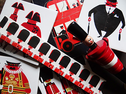 collection of vintage London items including vintage Him match-book and London series ceramic tiles designed by Kenneth Townsend