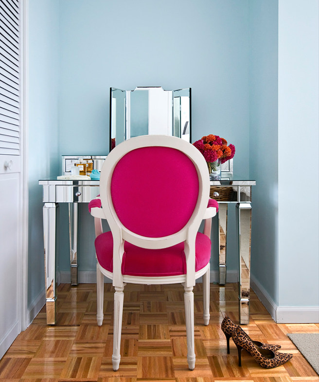 Dressing room with chair upholstered in hibiscus pink fabric