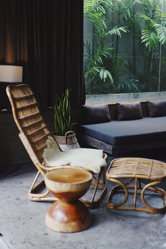Cane lounger and solid wood side table
