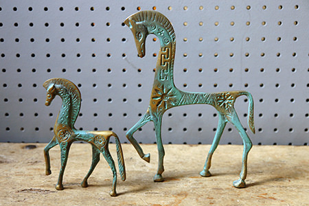 Pair of brass verdigris horse figures