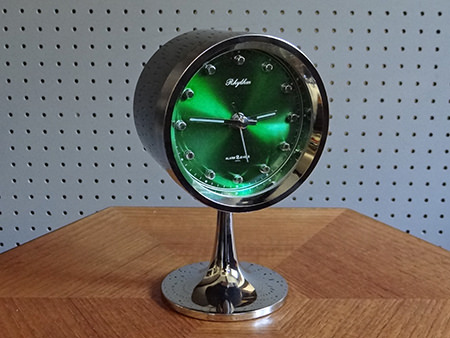 Vintage green Rhythm pedestal clock