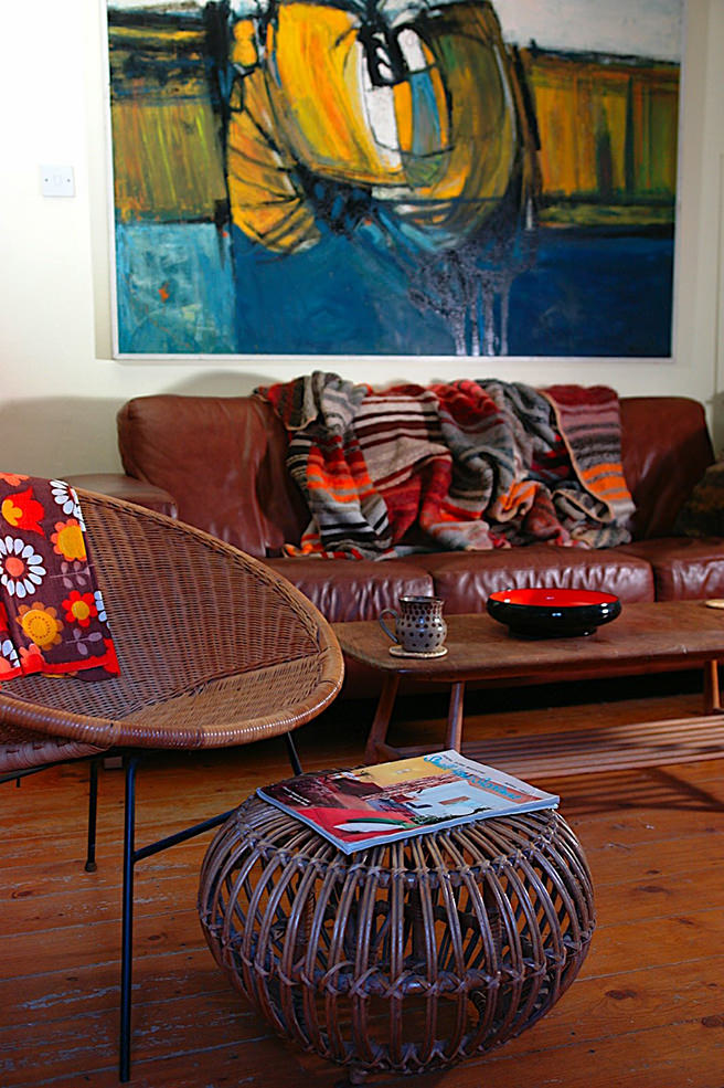 Handmade woollen throw over a leather sofa | H is for Home