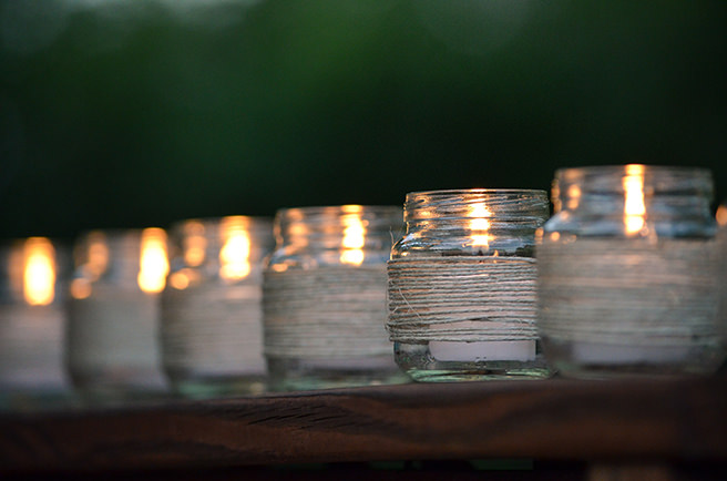 Jars upcycled into tea light holders