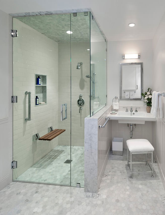 Bathroom with disability aids such as hand rails and shower seat