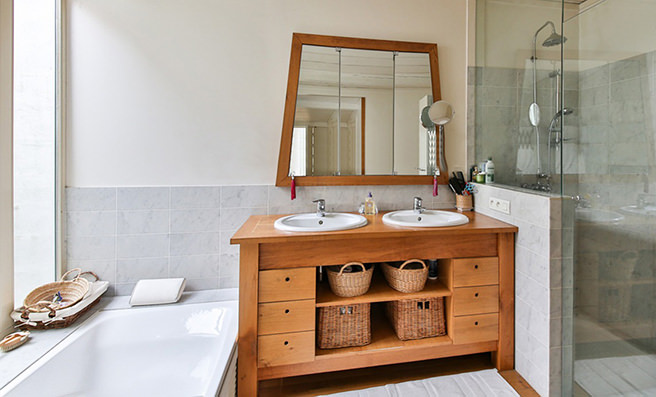 Modern bathroom with wooden vanity unit