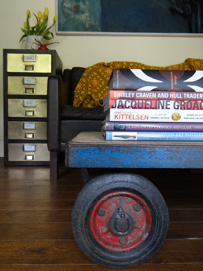 Vintage industrial trolley being used as a coffee table with contemporary metal drawers | H is for Home