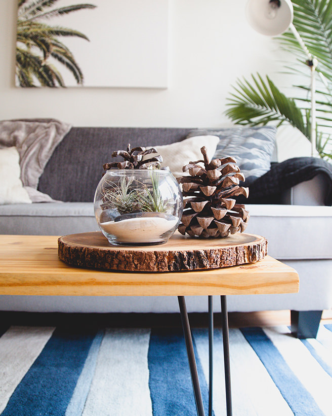Light grey sofa with coffee table in the foreground